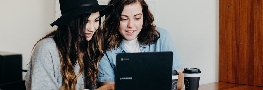 Two Women Freelancers Working in their laptop